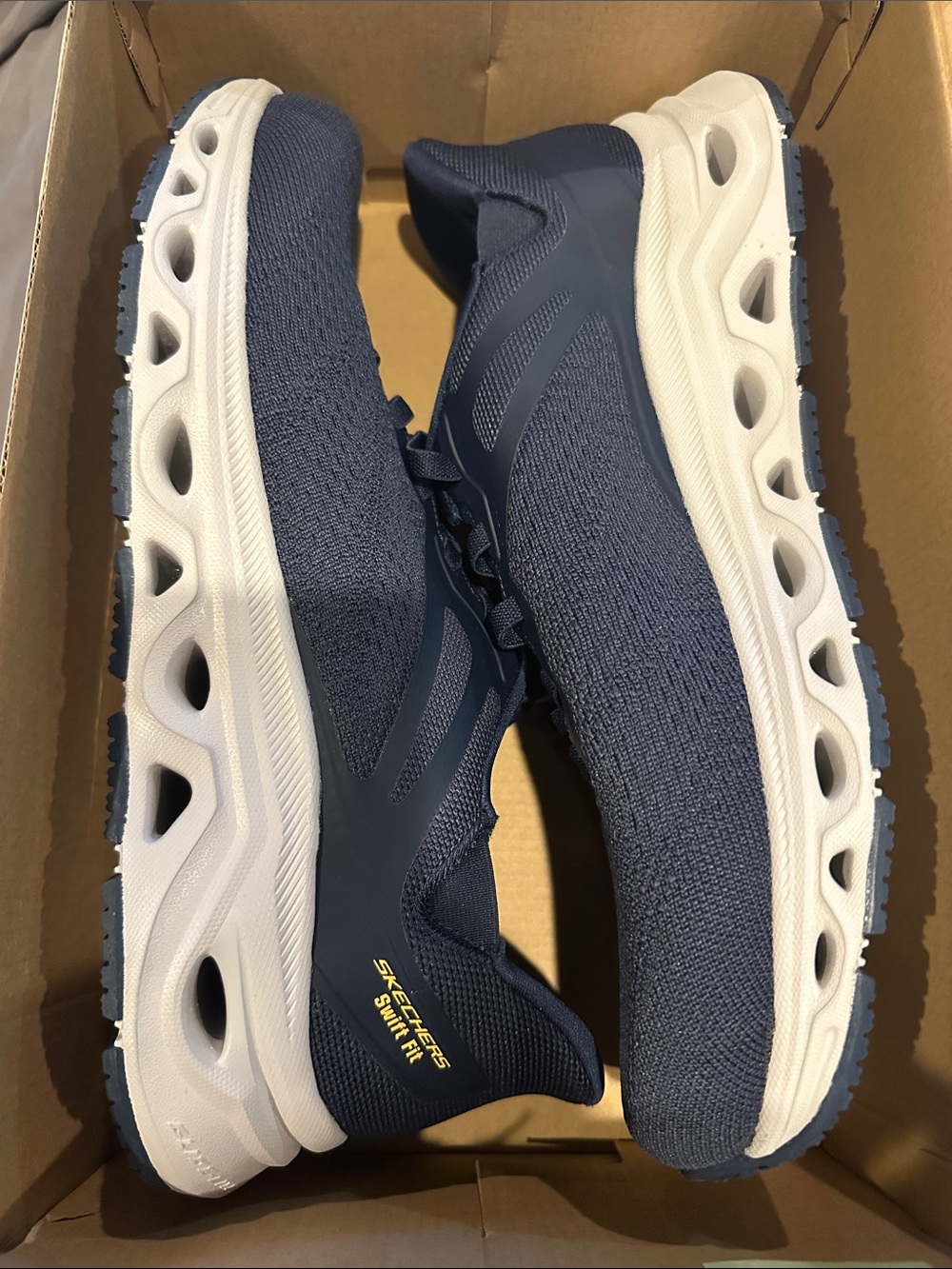 Skechers Navy and White Slip-On Knit Athletic Sneakers